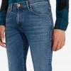 Jeans Stone Washed Wrangler Blu Fire Vestibilità Slim Fit